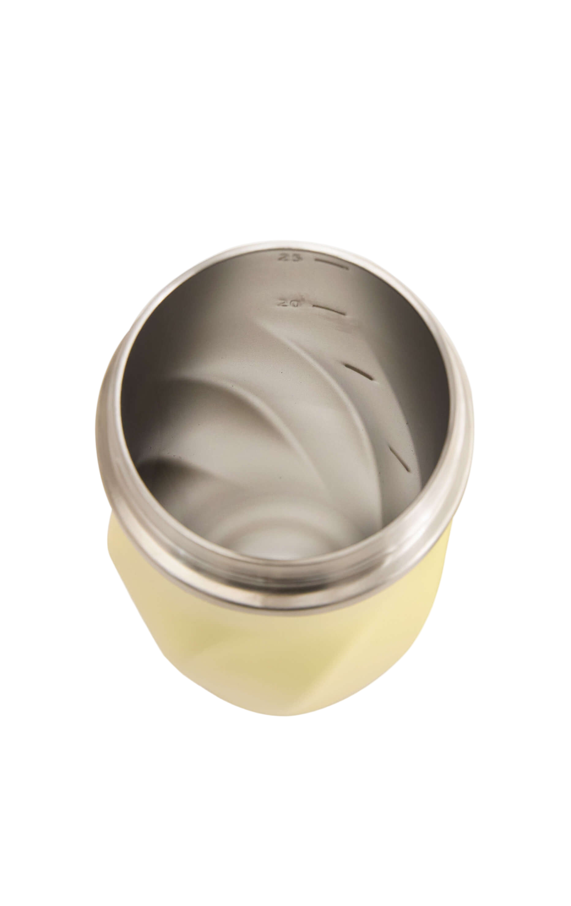 Stainless steel cup with beige base on a white background